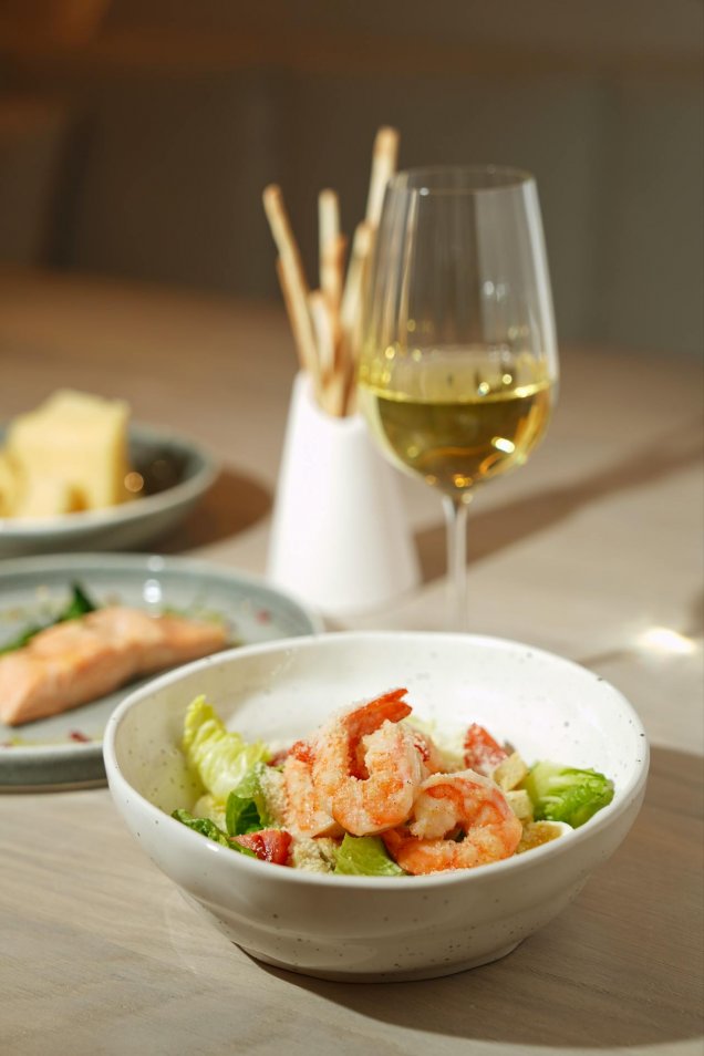 Healthy chopped salad with an orange vinaigrette and blackened shrimp-Recipe by Melissa Huerta